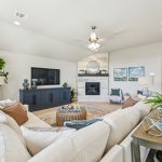 Timberbrook interior living room with fireplace center