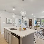 Timber Ridge interior kitchen island / living room angle 4