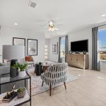 Creekside Ranch model interior living room angled from behind couch